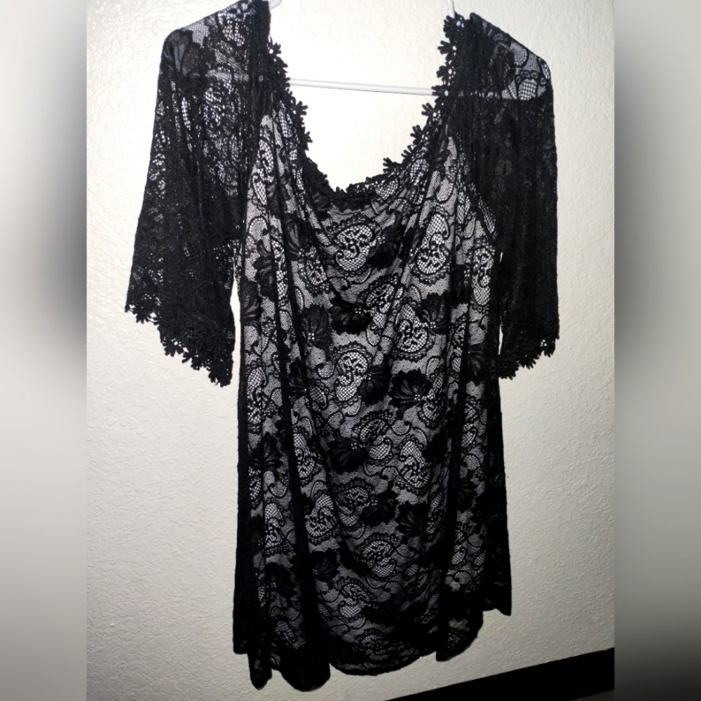 Little black lace mini dress with white underneath